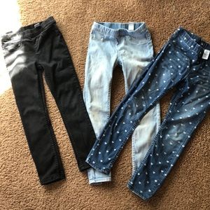 Three pairs of H&M denim leggings.  Size 6-7